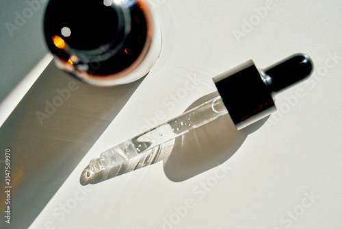 Skincare serum dropper with cosmetic oil bottle