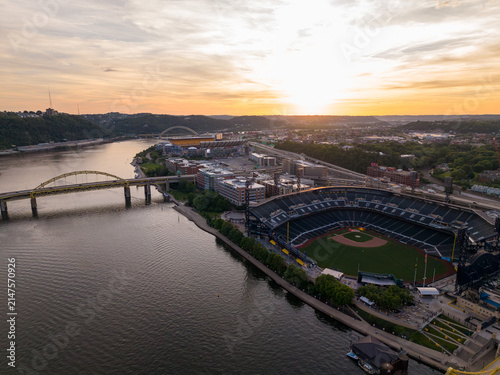 Aerial View of baseball stadium and Pittsburgh Skyline Along Allegheny River at Sunset