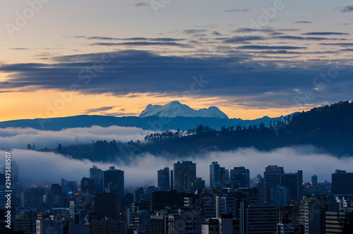 Sunrise in Quito with the Majestic Snow-Capped Antisana Over the City