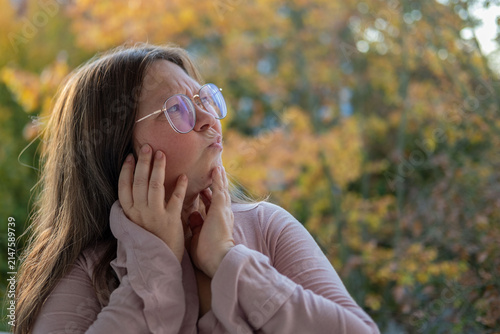 фотографія skeptical mature woman Outdoors, female face shows frustration, skepticism, and