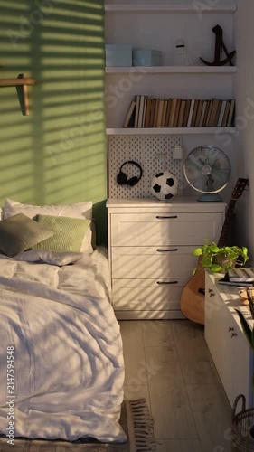 Cozy teenager's room with bed and other furniture, interior design. Camera moving left