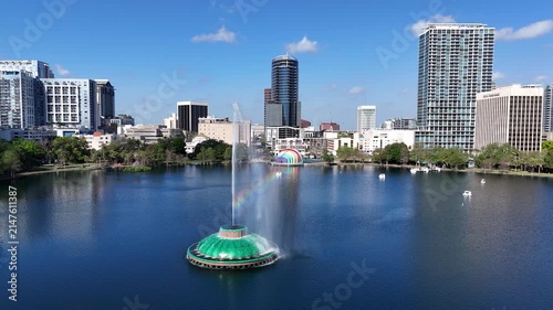 Flying by the fountain at Lake Eola in downtown Orlando in Orange County, Florida.
