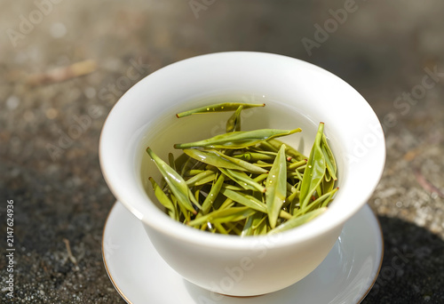 Fresh green tea leaves stee...
