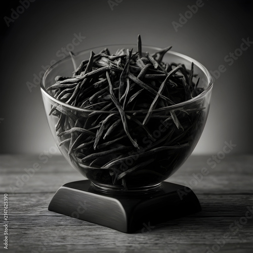 Dried tea leaves in a clear...