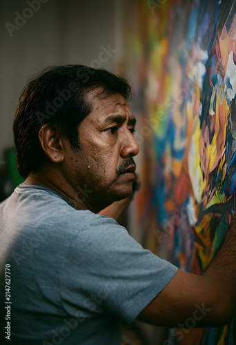 Mature male artist with a m...