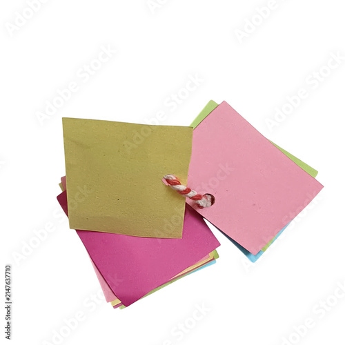 Pink and yellow geometric paper shapes with gold paperclip, flat lay pink paper yellow paper geometric shapes