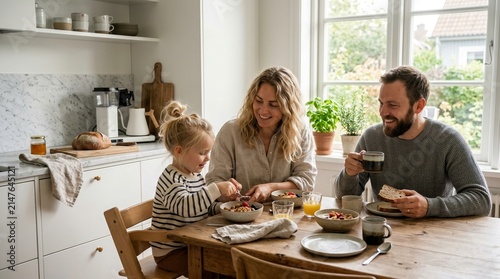 Family Enjoying Breakfast Together at Kitchen Table