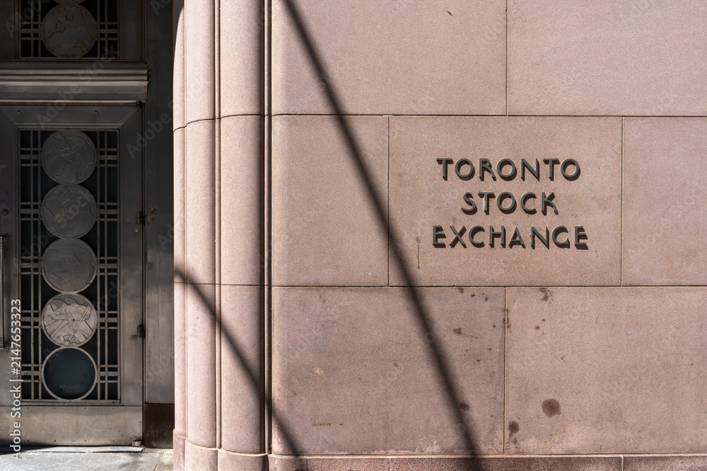Fototapeta premium Toronto, Ontario, Canada - August 5, 2026: The historic Toronto Stock Exchange (TSX) signage on its former Art Deco headquarters building on Bay Street in downtown Toronto, Ontario, Canada. 