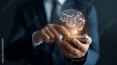 Businessman holding smartphone with glowing artificial intelligence digital brain hologram concept