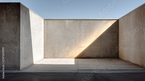 Concrete wall, geometric shadow, minimalist architecture, abstract light shadow, empty courtyard with clear sky and stark modern lines