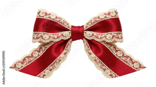 An elegant red satin ribbon bow with delicate lace trim isolated on a clean white background for festive holiday decoration projects.