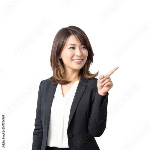 Professional woman in business attire pointing confidently