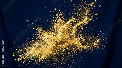 Dynamic Gold Dust Particle Burst and Wave on Dark Blue Background
