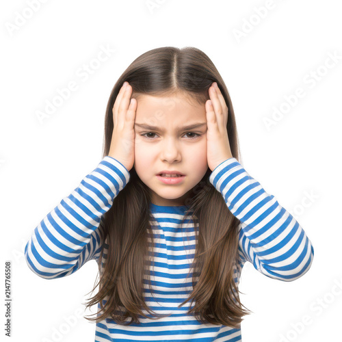 Young girl covering her ears with a serious expression