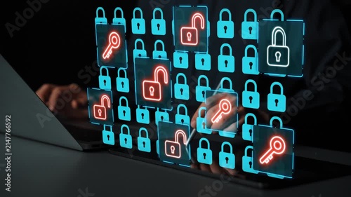 Digital Security Concept with Holographic Lock Icons and Unlock Symbols Displayed on Laptop Screen in Dark Setting for Cyber Protection. Entropy.