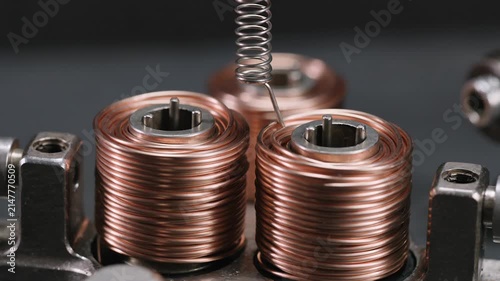Industrial manufacturing of copper wire electromagnetic coils. 4K Video