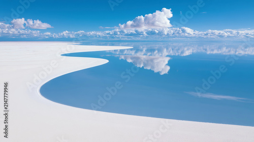 Winding Salt Flats Under Clear Blue Sky After Refreshing Rainfall
