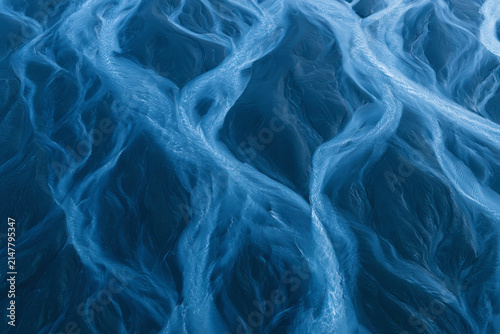 Abstract Braided Glacial Rivers Creating Natural Patterns in Blue