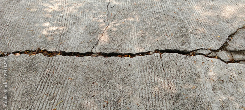 Bild auf Leinwand Surface texture of cracked concrete pavement
