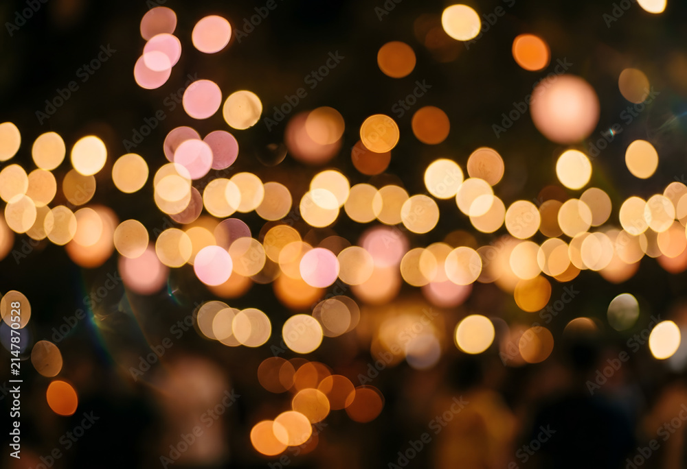 Fototapeta premium Abstract warm bokeh background with sparkling party string lights