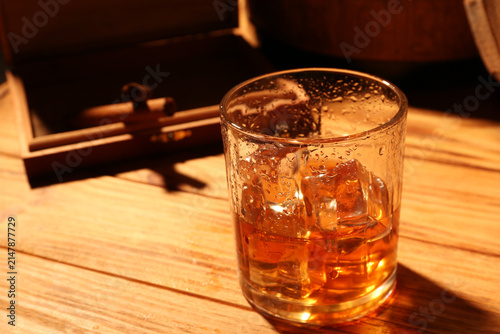 Glass of cold whiskey and c...