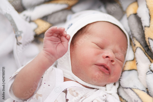 Photography Newborn Baby Boy Peacefully Resting in a Maternity Hospital, Draped in Soft Blan