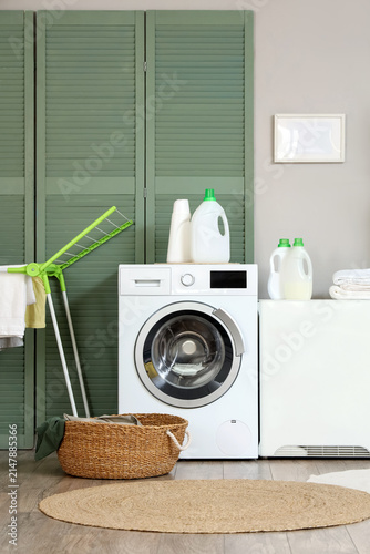 Interior of stylish laundry...