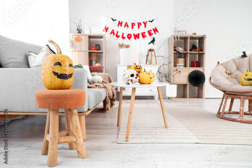 Halloween pumpkin on stool ...