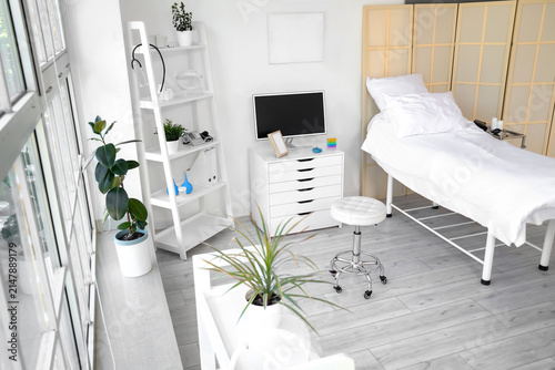 Interior of hospital ward with bed and monitor