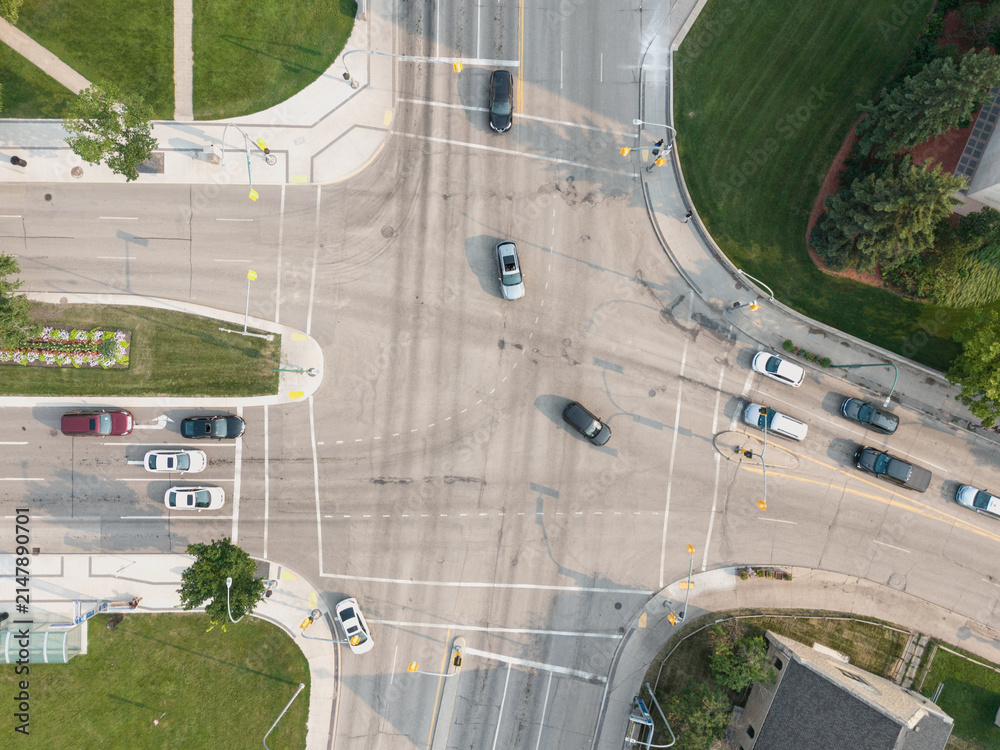 Fototapeta premium Aerial Drone View of Busy Urban Intersection and Traffic at