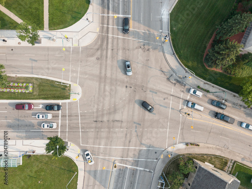 Aerial Drone View of Busy Urban Intersection and Traffic at
