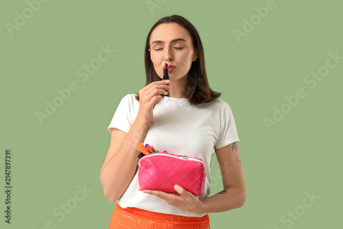 Beautiful young woman with ...