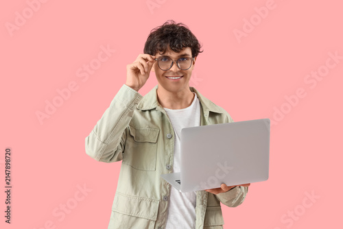 Male programmer with laptop...