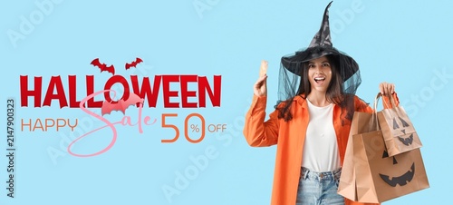Happy young woman in witch ...