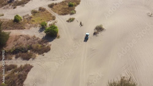 Aerial Top Down View of Off Road Vehicle Crossing Gumuk Pasir Parangkusumo Sand Dunes in Yogyakarta