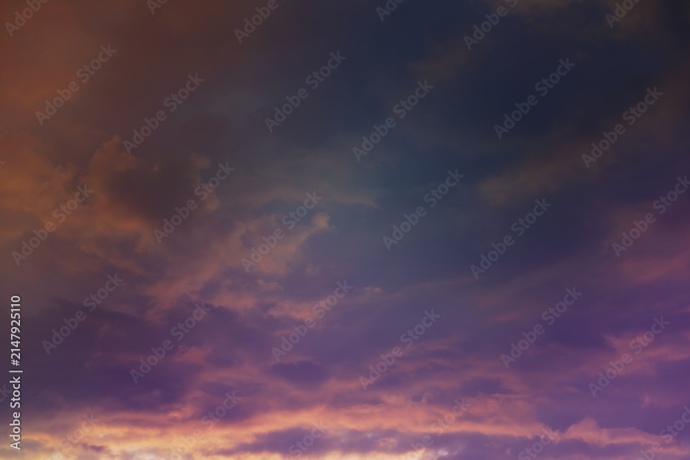 Obraz premium Beautiful sunset sky above clouds with dramatic light. Cabin view from airplane