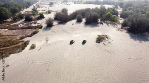 Aerial View of Two Off Road Vehicles Crossing Gumuk Pasir Parangkusumo Sand Dunes in Yogyakarta