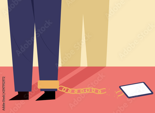 Foto Illustration of a leg chained to a mobile phone.