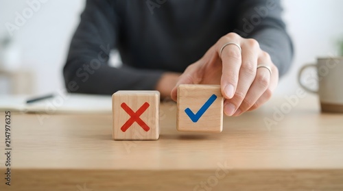 Hand choosing a wooden block with a blue check mark over a red cross