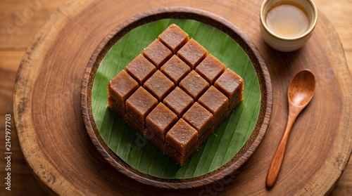 Stacked Palm Sugar Rice Cake Jelly Cubes on Wooden Tray