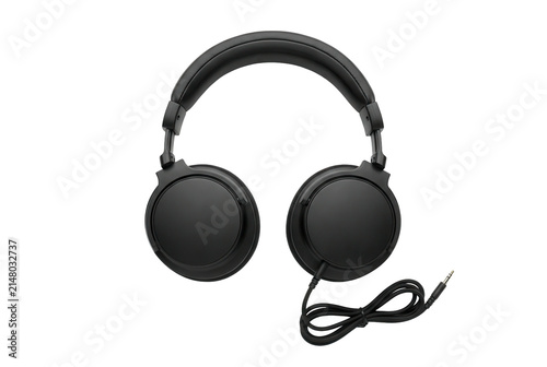 Black wired over ear headphones isolated on a plain dark background