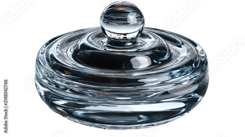 Crystal Lidded Jar: A clear, round crystal jar with an intricate ripple pattern on its lid and sides, showcasing elegant craftsmanship and material purity.