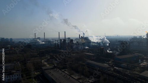 Foto Factory, industrial enterprise, metallurgical plant, smoke from chimneys, aerial photography from a drone