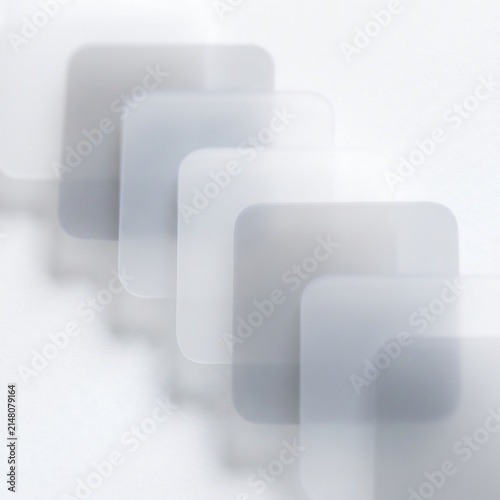 Abstract overlapping square glass plates with soft edges on white background abstract background geometric