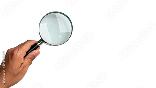 Human hand holding magnifying glass searching for clues isolated on transparent background for business analysis