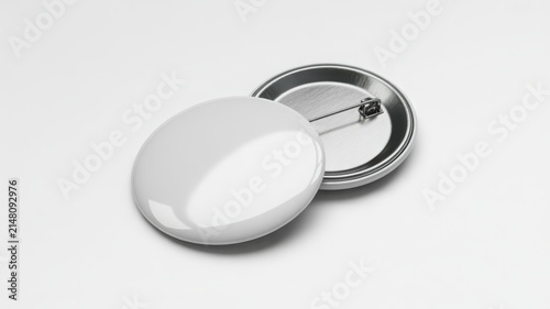 Two blank white round pin-back buttons isolated on white background