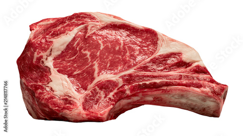 Raw marbled ribeye steak with bone, isolated on transparent background