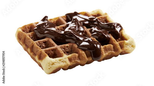 Картината върху платно Golden brown waffle topped with rich dark chocolate spread, isolated on transpar