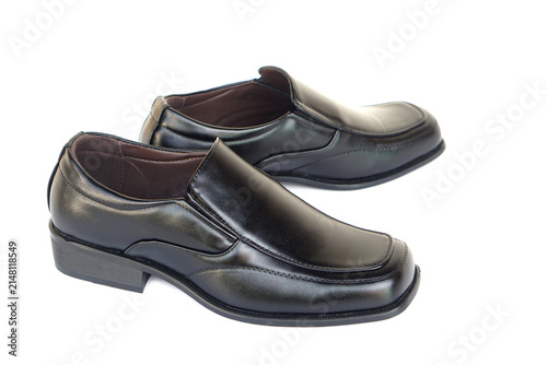 Картината върху платно Pair of black leather slip-on dress shoes isolated on a white background