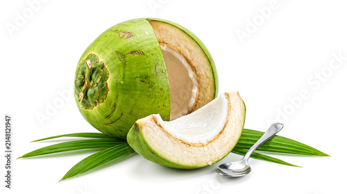 Fresh young coconut with a slice and a spoon isolated on white background